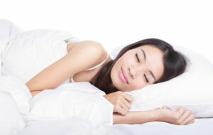 Woman Gets Sleep After TMJ Disorder Help from Hillsboro Dental Excellence