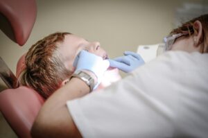 Child's dental check-up by a dentist