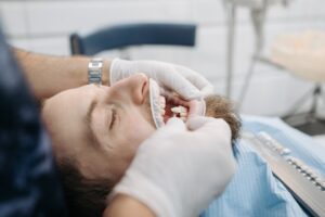 Dental patient receiving teeth color matching